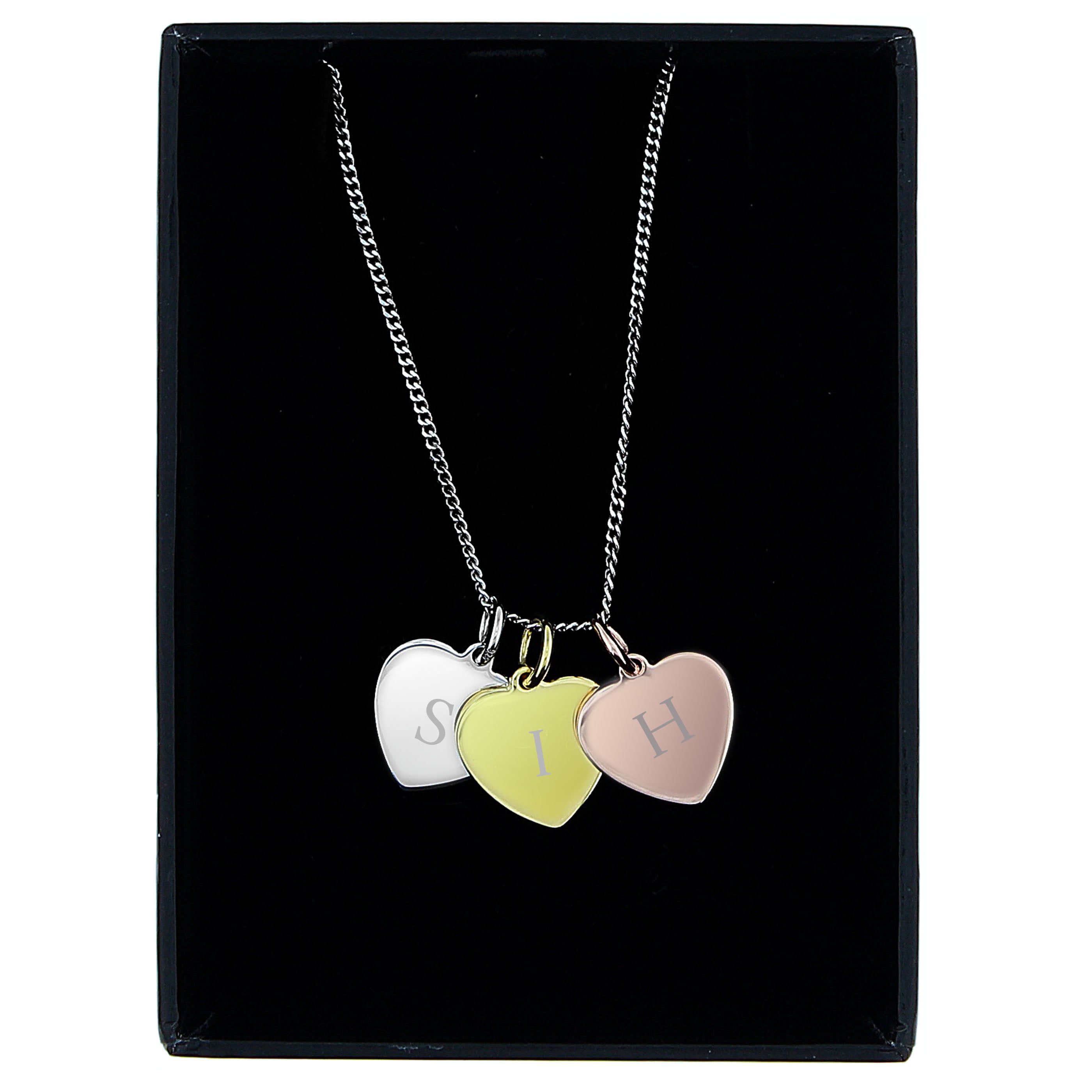Personalised Initials Gold Rose Gold and Silver Three Hearts Necklace On A Black Slab