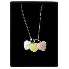 Personalised Initials Gold Rose Gold and Silver Three Hearts Necklace On A Black Slab