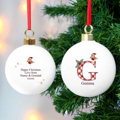 Personalised Initial Little Robin Bauble Hanging From A Christmas Tree
