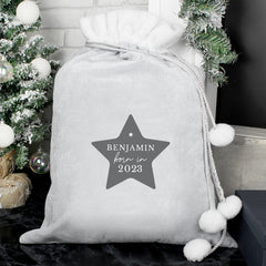 Our new Personalised Born in Luxury Silver Grey Sack is a unique and thoughtful way to present Christmas gifts.