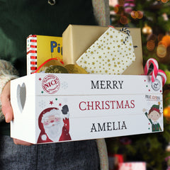 Personalised Christmas White Wooden Crate filled with gifts being held